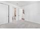 Bright bedroom with neutral carpet, closet, and adjoining bathroom at 2138 Whitney Marsh Aly, Orlando, FL 32804