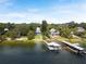Stunning waterfront homes featuring private docks on a serene lake setting at 12428 Summerport Ln, Windermere, FL 34786