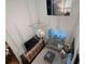 Living room with high ceilings, large windows, and comfortable seating area at 12428 Summerport Ln, Windermere, FL 34786