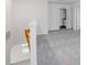 Bright loft area with grey carpet and a half-bathroom at 428 Wayland Dr, Haines City, FL 33844