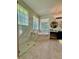Spa-like bathroom with glass shower, soaking tub, shiplap, and stylish vanity at 4901 Shoreline Cir, Sanford, FL 32771