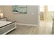 Bedroom view highlighting neutral paint and decor; access to ensuite at 4901 Shoreline Cir, Sanford, FL 32771