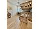 Well-lit bunk bedroom has wood-look floors and a desk at 4901 Shoreline Cir, Sanford, FL 32771