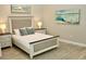 Cozy bedroom with neutral tones and decorative accents creates a relaxing atmosphere at 4901 Shoreline Cir, Sanford, FL 32771