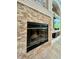 Stone fireplace with mantle and trim at 4901 Shoreline Cir, Sanford, FL 32771