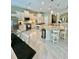 Bright open kitchen with stainless steel appliances and granite counters at 4901 Shoreline Cir, Sanford, FL 32771
