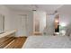 Well-lit bedroom with a comfortable bed, closet, and easy access to an ensuite bathroom at 5875 Talavera St, Orlando, FL 32807