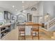 Bright and airy kitchen features stainless steel appliances and an island with bar seating at 1663 Meadowgold Ct, Winter Park, FL 32792