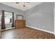 Well-lit bedroom featuring wood-look floors at 250 Shady Oaks Cir, Lake Mary, FL 32746