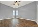 Bright bedroom with wood-look floors and ceiling fan at 250 Shady Oaks Cir, Lake Mary, FL 32746