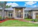 Attractive entryway with brick walkway and double doors at 250 Shady Oaks Cir, Lake Mary, FL 32746