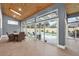 Relaxing pool area with a wooden ceiling and sliding doors to the interior at 250 Shady Oaks Cir, Lake Mary, FL 32746