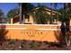 The Venetian Place sign is set among lush landscaping in this well-kept community at 4642 Commander Dr # 933, Orlando, FL 32822