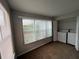 Convenient laundry room with a modern washer, dryer and window, making chores a breeze at 4642 Commander Dr # 933, Orlando, FL 32822