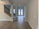 Bright and airy entryway with tile flooring and double French doors at 2522 Cedar Shake Ct, Oviedo, FL 32765