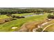 Picturesque golf course with serene lakes and walking paths at 3201 Songbird Cir, Harmony, FL 34773