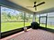 Relaxing screened patio with brick flooring and backyard view at 3201 Songbird Cir, Harmony, FL 34773