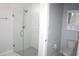 Modern bathroom with glass shower doors and toilet at 1148 Bancroft St, Deltona, FL 32725