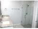 Bathroom boasts double vanity, granite countertop and large shower at 1148 Bancroft St, Deltona, FL 32725