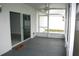 Screened porch with ceiling fan and backyard access at 1148 Bancroft St, Deltona, FL 32725