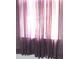 Window with sheer purple curtains at 1148 Bancroft St, Deltona, FL 32725