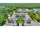 Expansive aerial view of the community's multiple buildings surrounded by lush, green landscaping at 1401 Celebration Ave # 402, Celebration, FL 34747