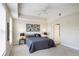 Cozy bedroom with ceiling fan and neutral carpet at 1401 Celebration Ave # 402, Celebration, FL 34747