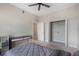 Bedroom with a closet, desk, and overhead fan at 1401 Celebration Ave # 402, Celebration, FL 34747