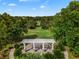 Scenic aerial shot of a park with walking paths and lush greenery, perfect for outdoor recreation at 1401 Celebration Ave # 402, Celebration, FL 34747