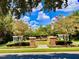 Community courtyard with fountain, landscaping, and brick pavilions at 6533 Cartmel Ln, Windermere, FL 34786