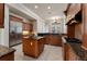 Kitchen with stainless steel appliances and granite countertops at 6533 Cartmel Ln, Windermere, FL 34786