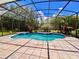 Relaxing screened pool and spa area at 6533 Cartmel Ln, Windermere, FL 34786