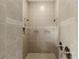 Large walk-in shower with double shower heads at 6533 Cartmel Ln, Windermere, FL 34786