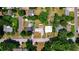 Birds eye view of houses in a leafy suburban neighborhood with green lawns, showcasing property layout and neighborhood charm at 2812 Dawley Ave, Orlando, FL 32806