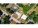 Aerial view of homes with lush green yards, driveways, and a pool at 2812 Dawley Ave, Orlando, FL 32806