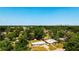 Aerial view of residential homes surrounded by mature trees with city skyline view at 2812 Dawley Ave, Orlando, FL 32806