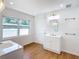 Light and bright bathroom featuring sleek fixtures and a modern vanity at 2812 Dawley Ave, Orlando, FL 32806