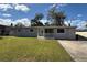 Charming single-story home with a well-manicured front lawn and inviting entrance at 2812 Dawley Ave, Orlando, FL 32806