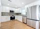 View of kitchen with stainless steel refrigerator and appliances at 2812 Dawley Ave, Orlando, FL 32806