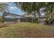 Private backyard with pool and lush landscaping at 105 James Pond Ct, Debary, FL 32713