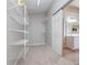 Large walk-in closet with wire shelving and built in storage at 105 James Pond Ct, Debary, FL 32713