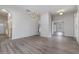 Bright dining room with chandelier and wood-look floors at 105 James Pond Ct, Debary, FL 32713