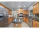 Modern kitchen with stainless steel appliances and granite countertops at 105 James Pond Ct, Debary, FL 32713