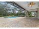 Screened pool and patio area with brick pavers at 105 James Pond Ct, Debary, FL 32713