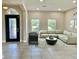 Spacious living room with sectional sofa and large windows at 2475 Hastings Blvd, Clermont, FL 34711