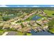 Aerial view of a lakefront community with luxury homes and lush landscaping at 4118 Isle Vista Ave, Belle Isle, FL 32812