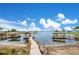 Private wooden dock with multiple covered slips at 4118 Isle Vista Ave, Belle Isle, FL 32812