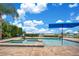 Lakefront pool with spa and fire pit at 4118 Isle Vista Ave, Belle Isle, FL 32812