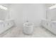 Spa-like bathroom with freestanding tub and double vanities at 15023 Pendio Dr, Montverde, FL 34756