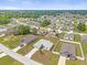Aerial view of the house and surrounding neighborhood at 325 Daffodil Ln, Kissimmee, FL 34759